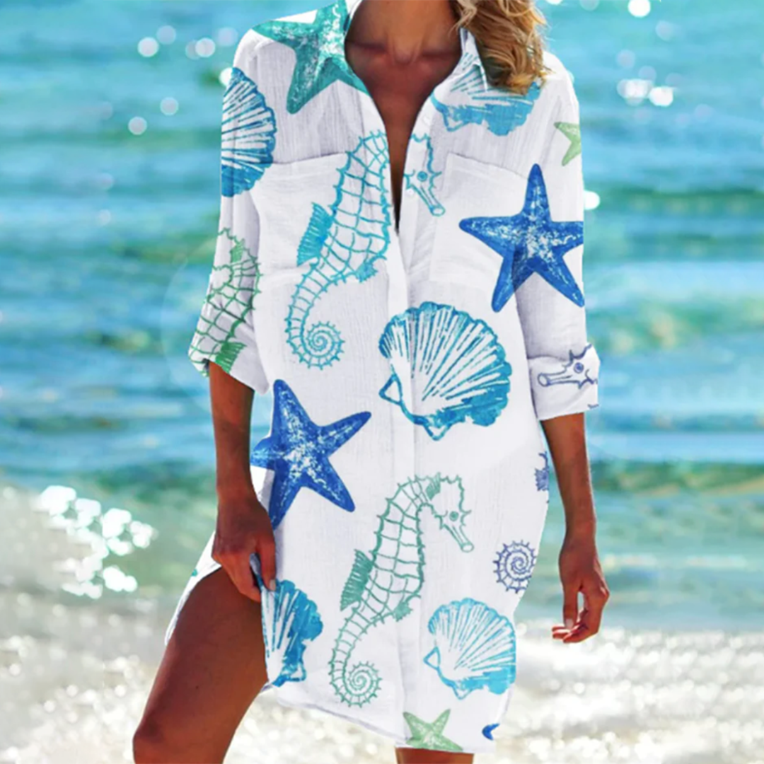 Stylish women's tropical print summer top, loose fit, perfect for beach vacations.