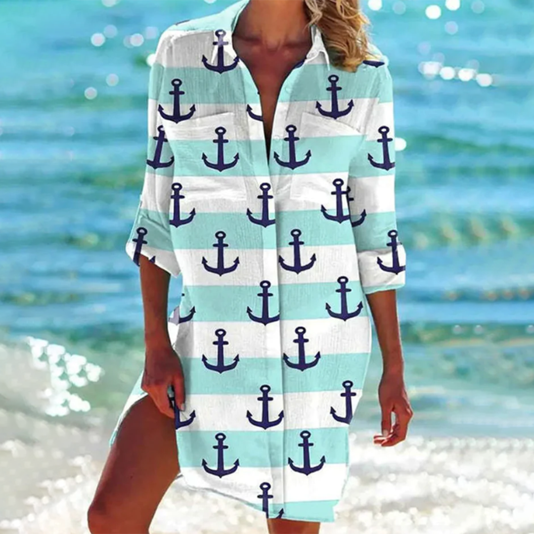 Women's casual summer shirt, vibrant print, a-line, flowy, ideal for beachwear.