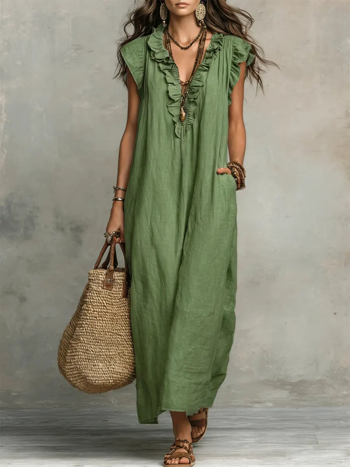 Casual women's boho summer maxi dress, V-neck, flutter sleeves, ruffles & pockets detail.