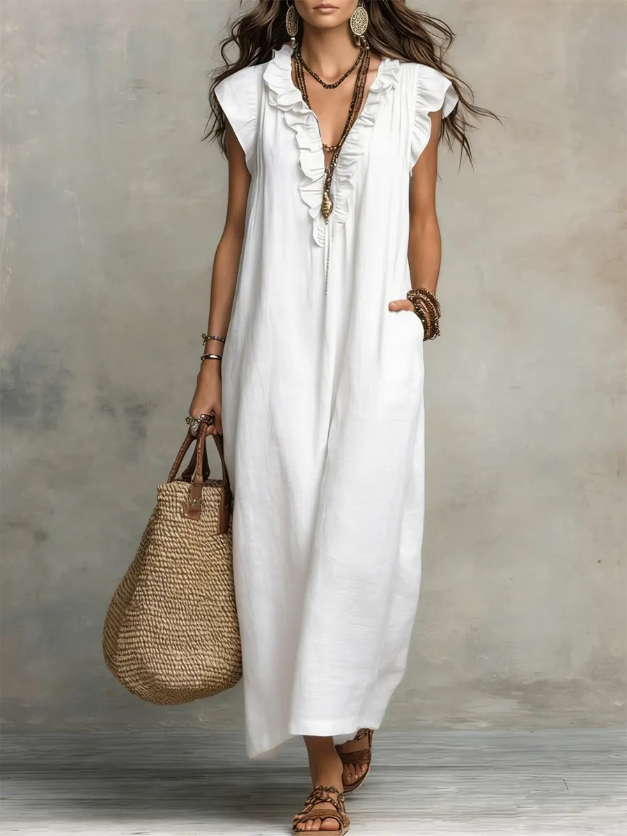 Comfortable women's summer maxi dress with flowy design, V-neck, flutter sleeves & pocket.