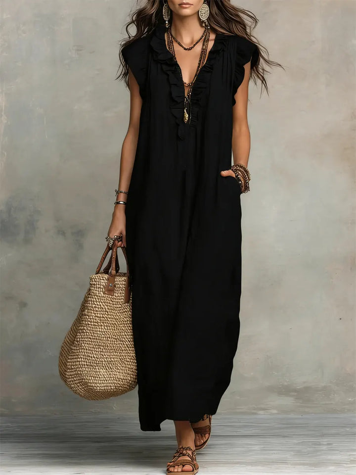 Elegant women's ruffle V-neck maxi dress, flowy silhouette, and stylish flutter sleeves.