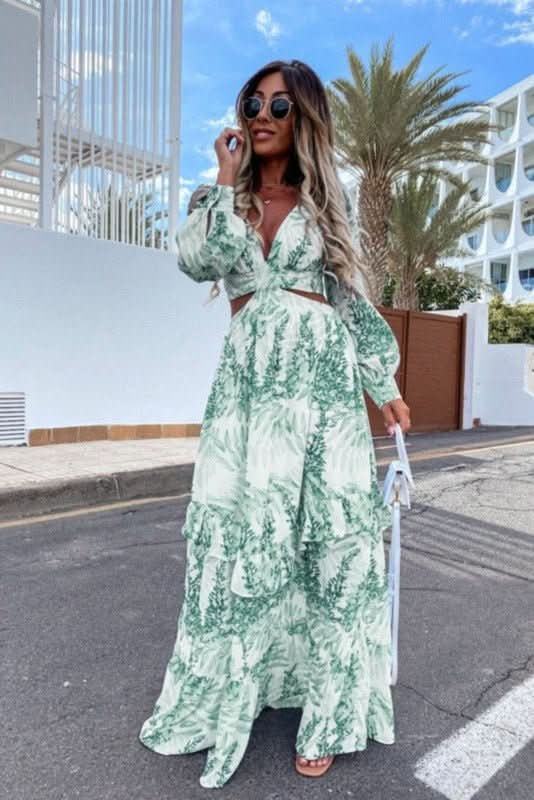Long elegant women's summer maxi dress with a beautiful flowy design, perfect for warm weather and special occasions.