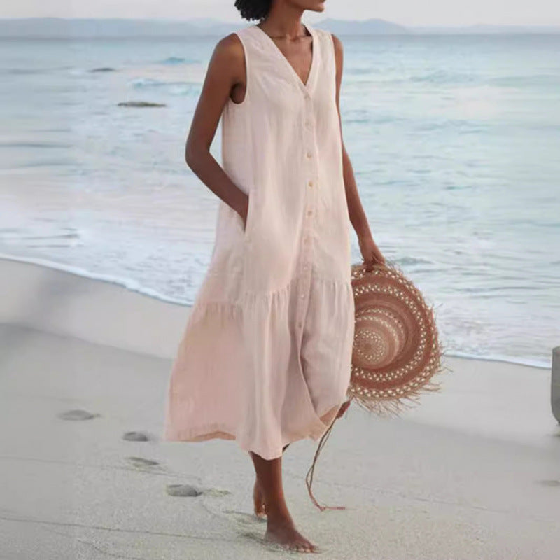 Women's flowy V-neck button front tiered midi summer dress, perfect for casual outings or beach vacations.