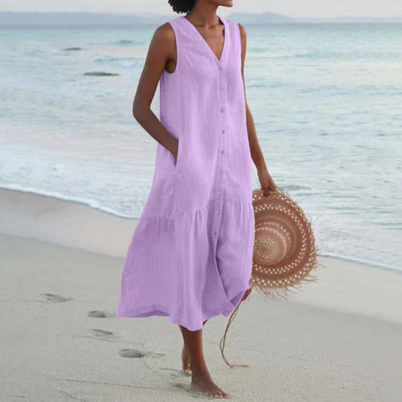 Versatile women's sleeveless V-neck tiered midi dress with button front. Comfortable and elegant for summer outfits.