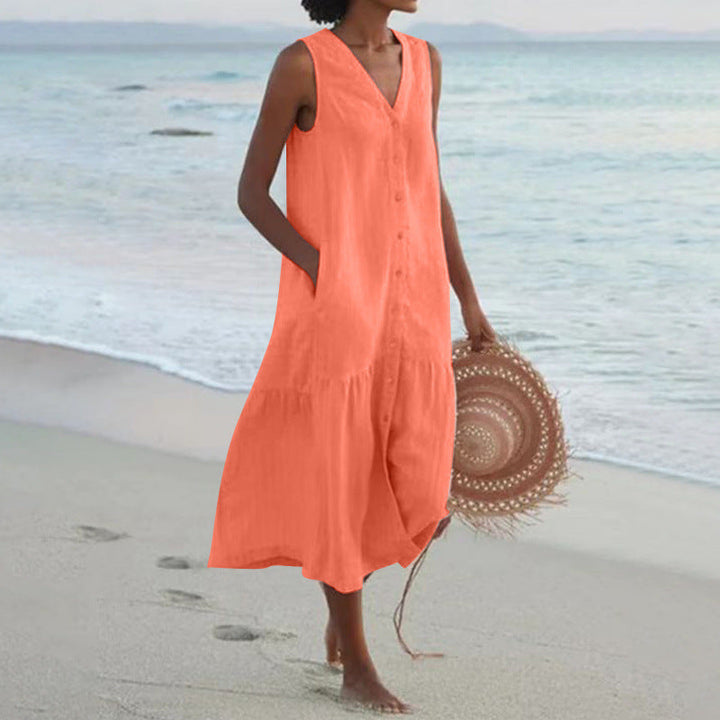 Comfortable women's tiered V-neck midi dress for summer, featuring button front. Casual yet elegant beach wear.