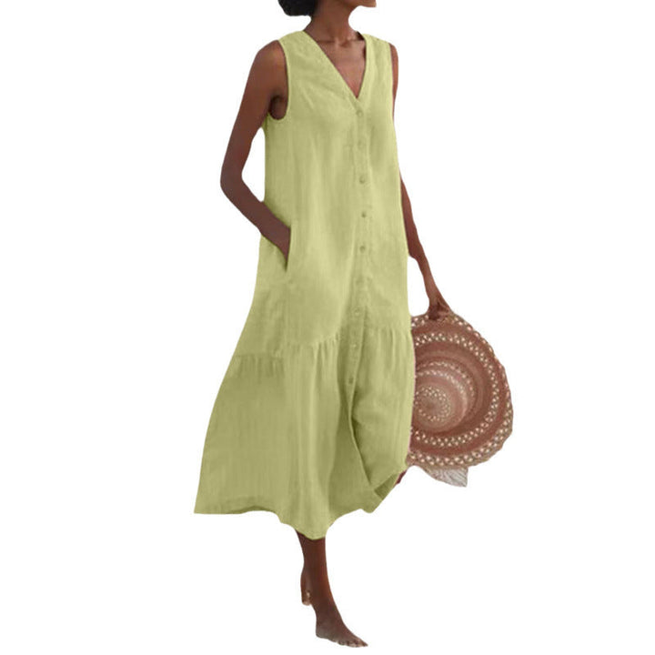Detailed view of the button front on a women's V-neck tiered midi summer dress, ideal for casual wear.