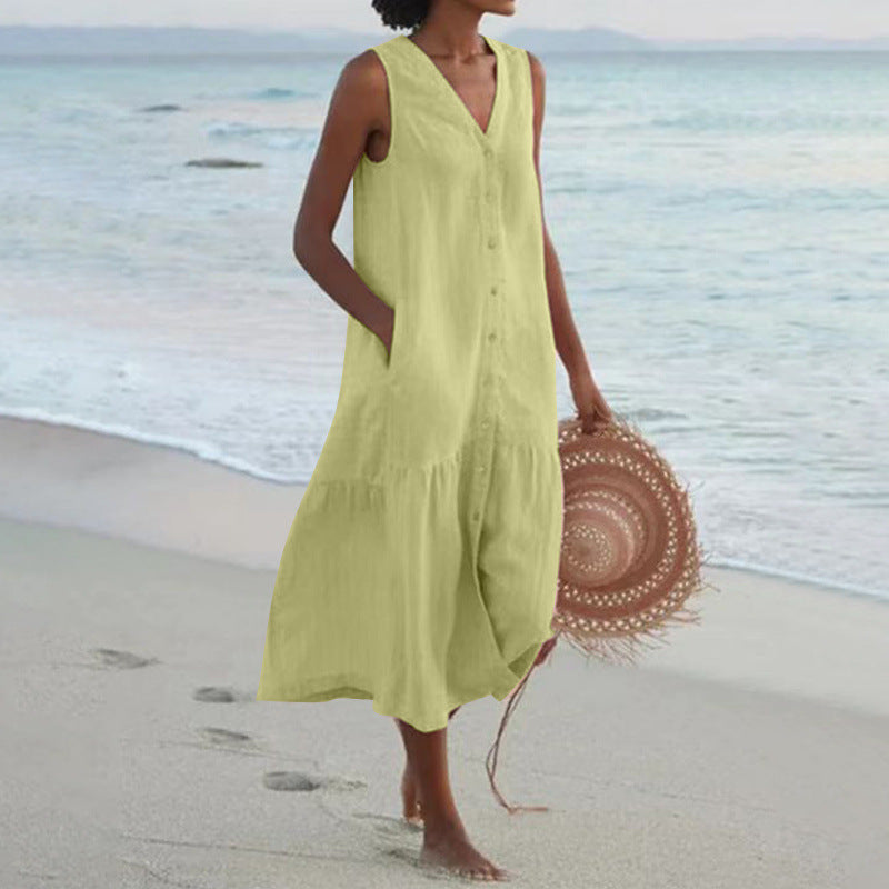 Women's comfortable V-neck button front tiered midi dress for summer. Flowy and elegant, perfect for vacation.