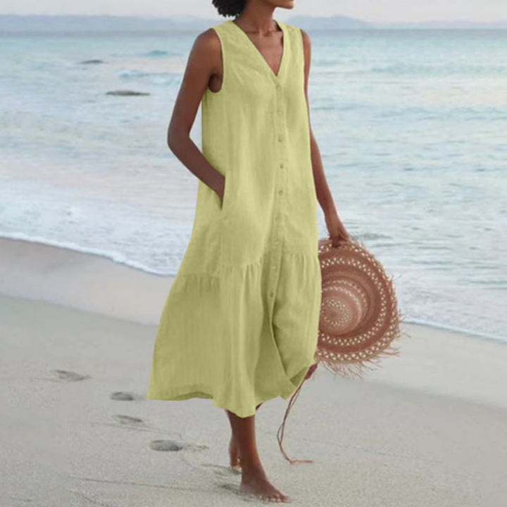 Women's comfortable V-neck button front tiered midi dress for summer. Flowy and elegant, perfect for vacation.