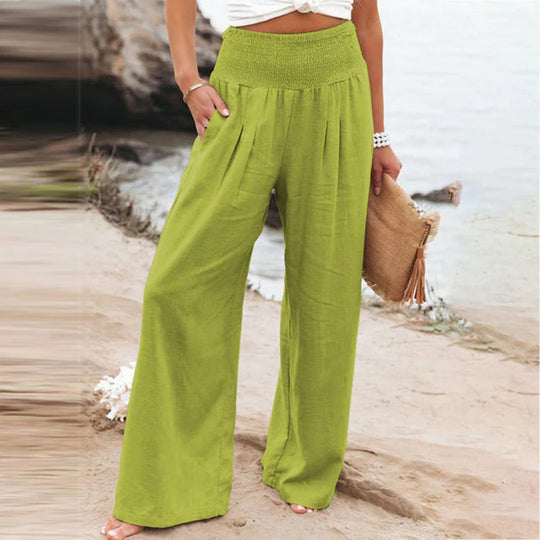 Versatile women's flowy wide leg pants with elastic waist, perfect for a comfortable and chic summer look.