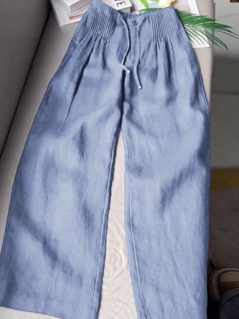 Stylish women's wide-leg flowy pants, ideal for spring & summer casual fashion.