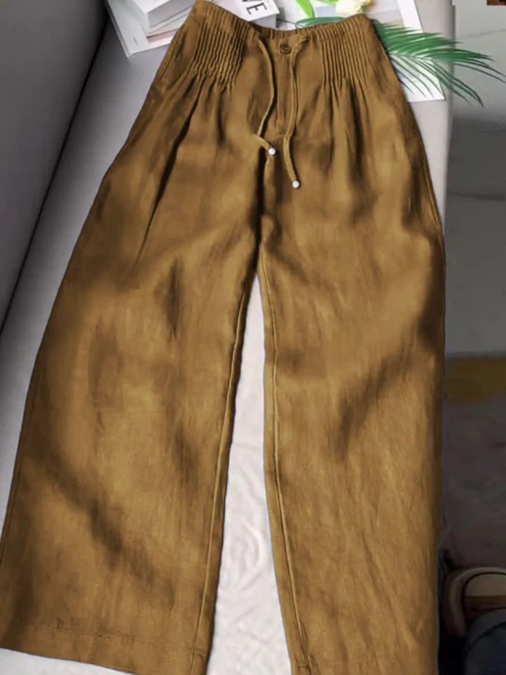 Loose fit women's flowy trousers with an elastic waist for ultimate comfort and freedom.