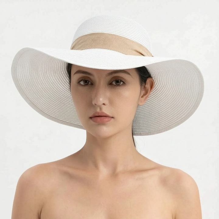 Essential women's wide brim sun hat, designed to be foldable for travel & offer superior UV protection.
