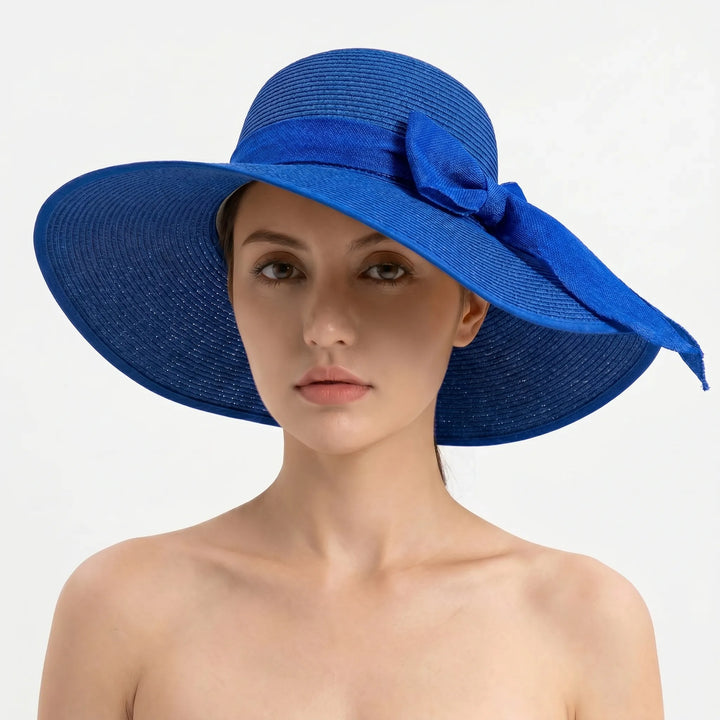 Women's summer sun hat with a wide, foldable brim, providing ultimate UV protection and resort fashion.