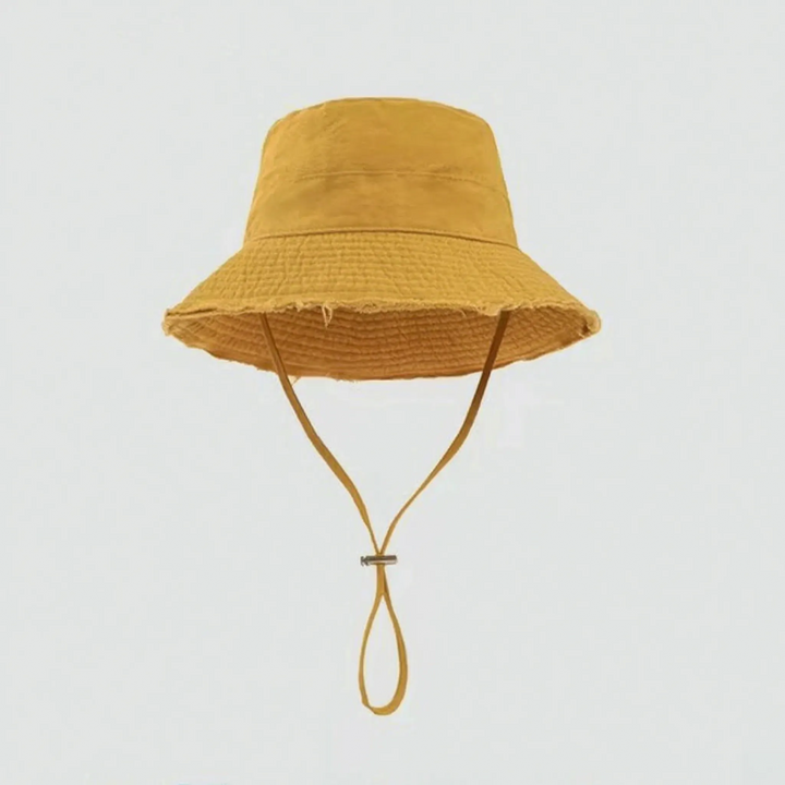 Protect your face with this adjustable women's frayed brim bucket hat. Ideal for summer & travel.