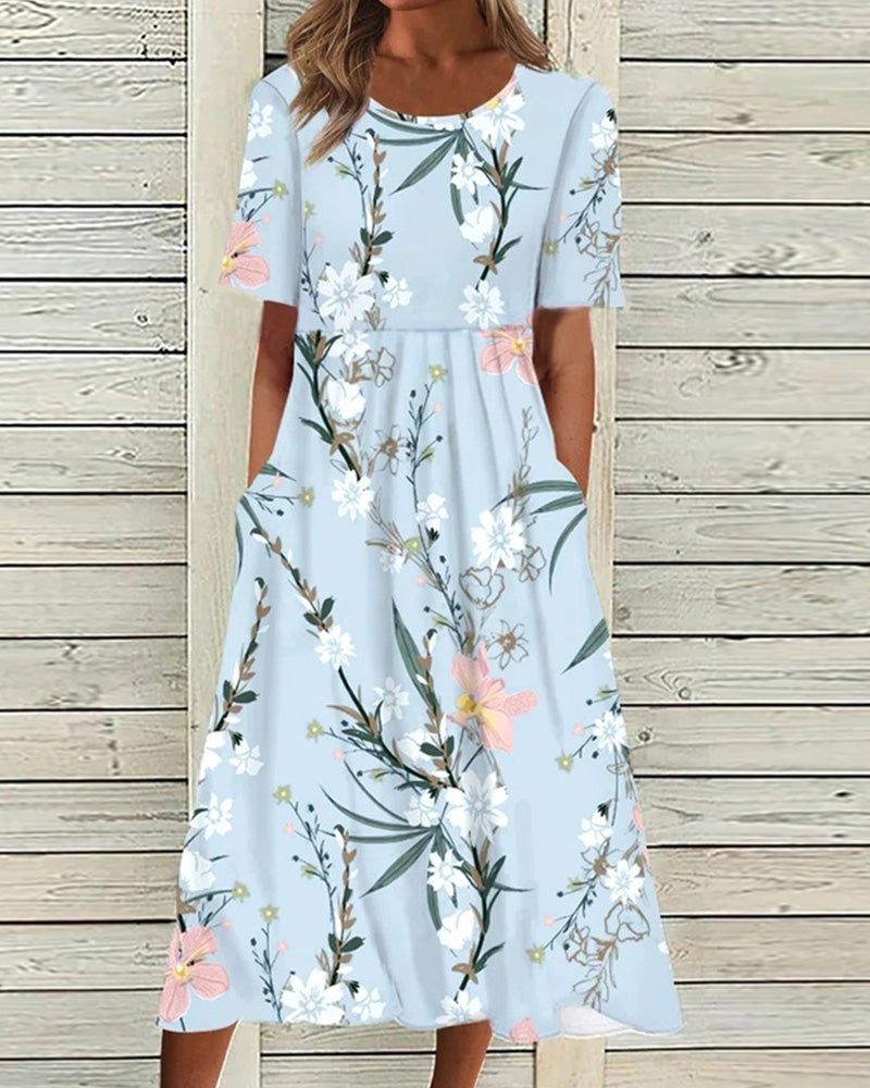 Women's fresh floral A-line midi dress with round neck. Perfect for spring and summer casual elegance.