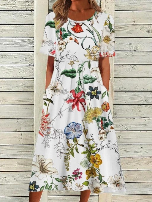Lightweight women's floral midi dress, A-line design, round neck. Essential for summer fashion.