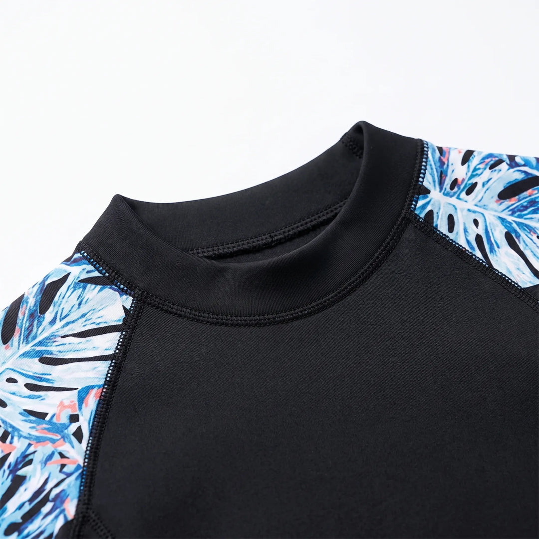 Protective women's full wetsuit with rash guard, perfect for active water sports & thermal comfort.