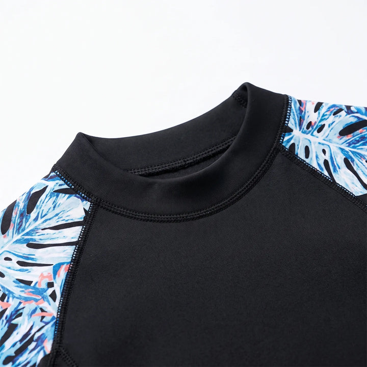 Protective women's full wetsuit with rash guard, perfect for active water sports & thermal comfort.