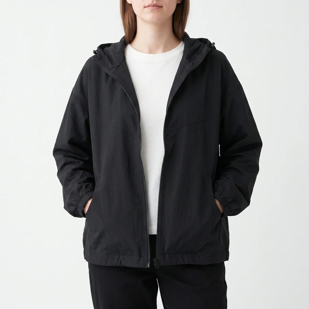 Lightweight women's casual hooded windbreaker. Perfect transitional outerwear for spring and fall fashion.
