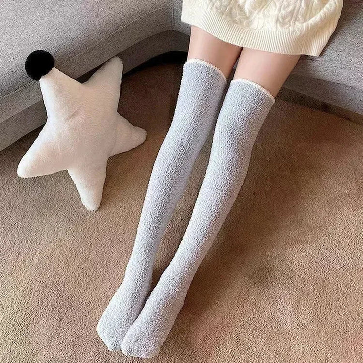 Women's fuzzy knee high socks. Super soft, warm, and comfortable solid color loungewear for cozy winter days.