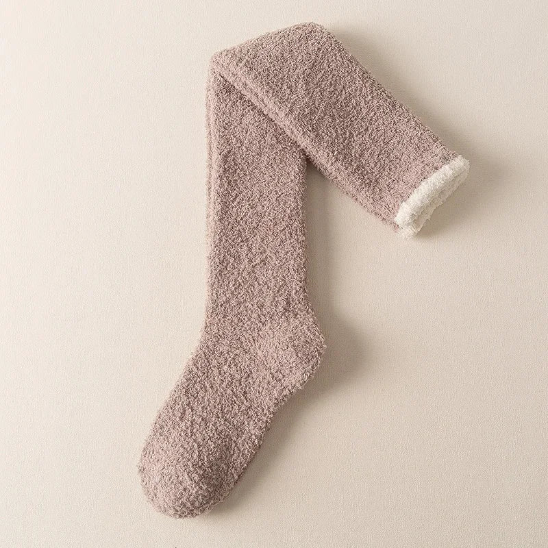 Ultra-comfortable women's fuzzy knee high socks, perfect for cozy warmth in winter. Soft solid color loungewear.