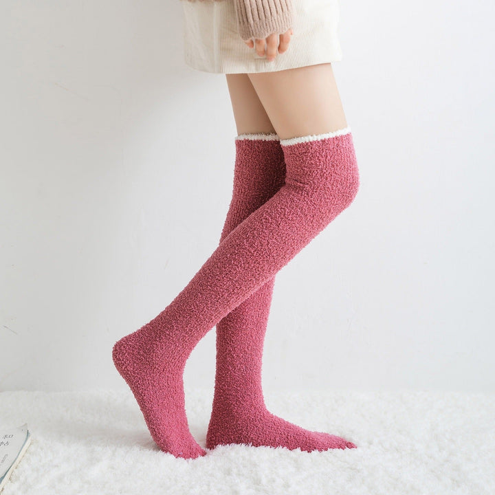 Warm and cozy fuzzy knee high socks for women. Solid color, comfortable winter loungewear socks for ultimate warmth.