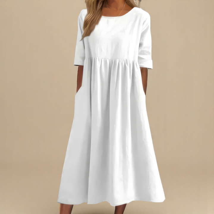 Versatile women's half-sleeve midi dress, perfect for everyday. Relaxed fit, scoop neck, and gathered waist.