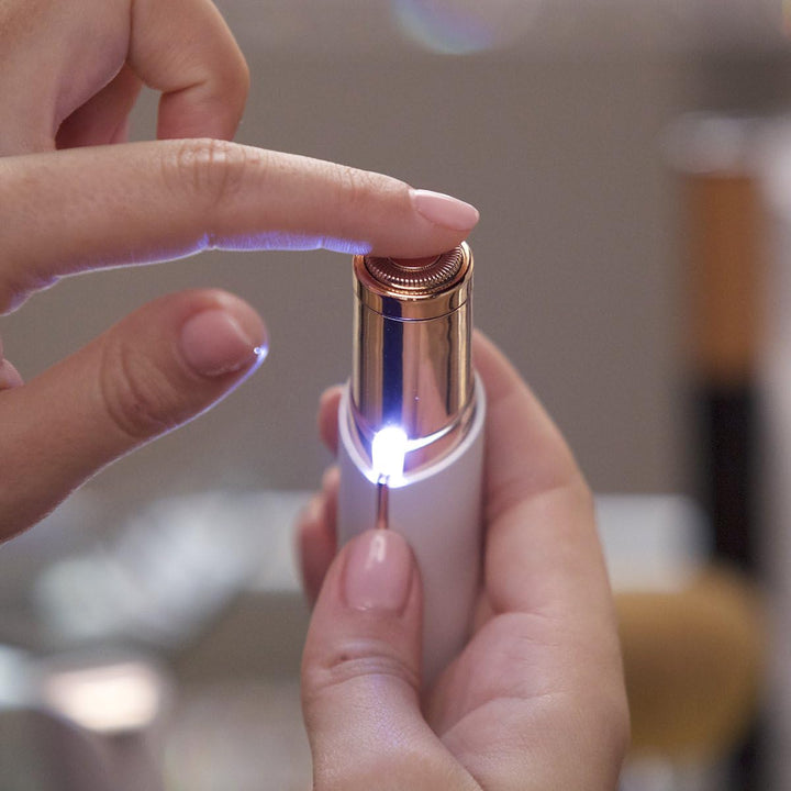 Precision facial hair remover for women, offering gentle hair removal & a smooth finish. Essential grooming tool.
