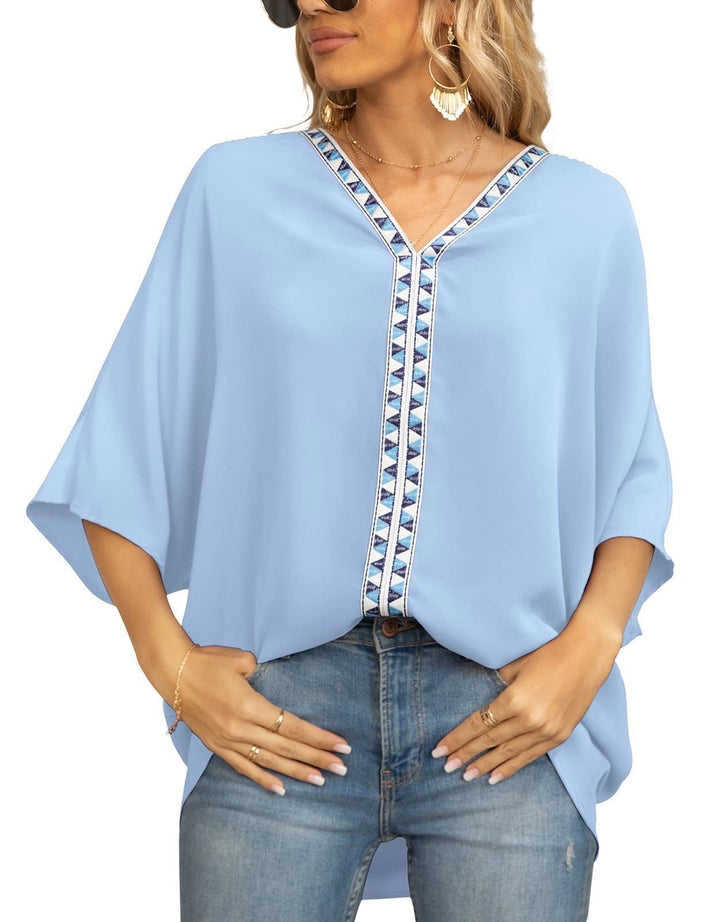 Trendy women's summer tunic top, V-neck with eye-catching geometric trim, comfortable and casual.