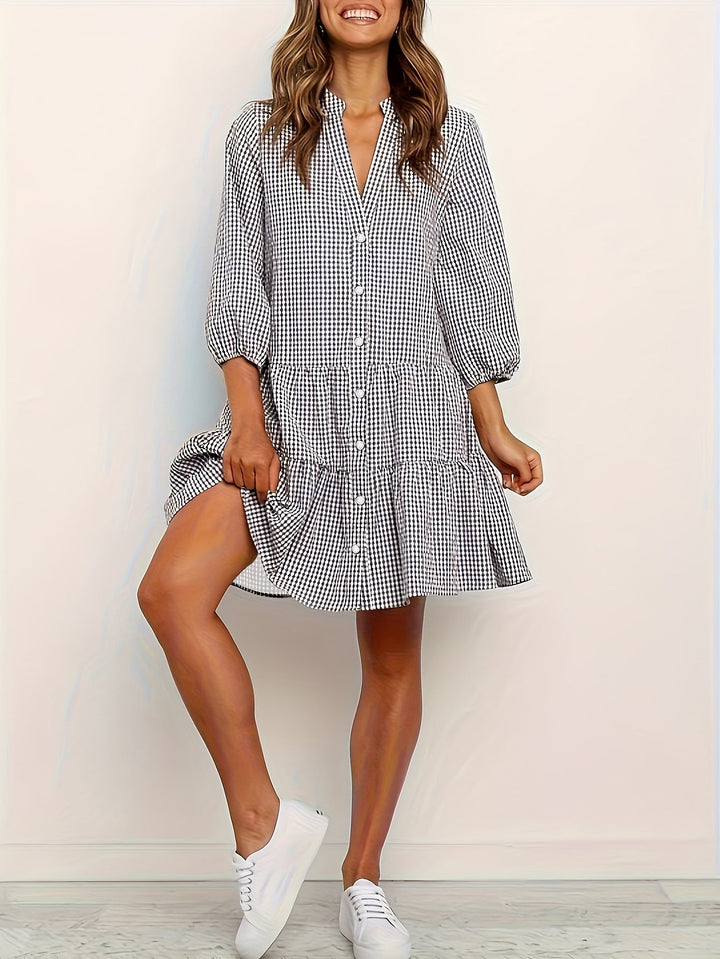 Classic gingham check tiered mini dress for women. Effortless summer day dress, ideal for vacations.