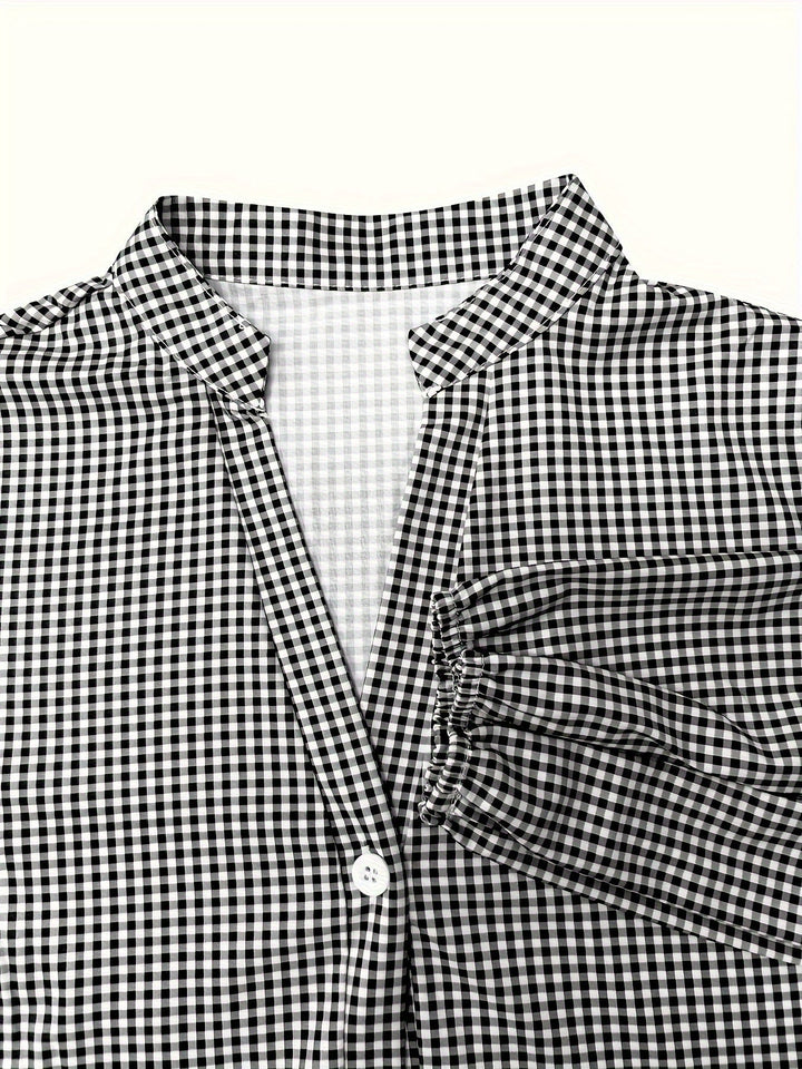 Stylish women's tiered mini dress in gingham check. Features trendy puff sleeves and a flattering summer fit.