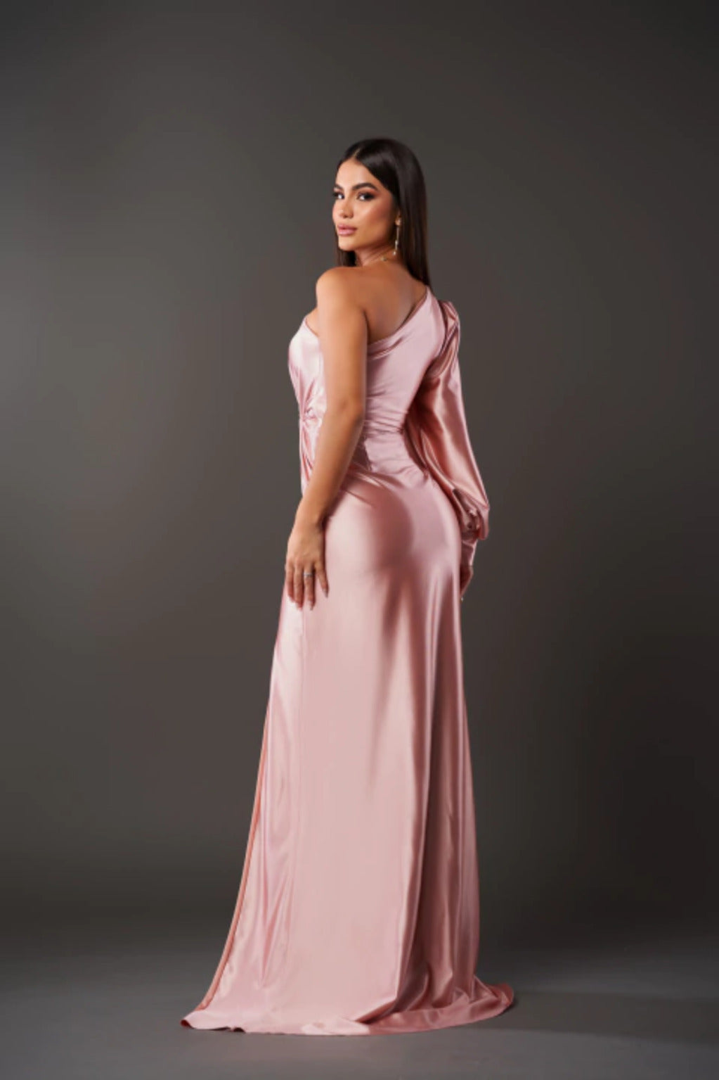 Luxurious one-shoulder satin gown, draped elegance for women's wedding guest attire.