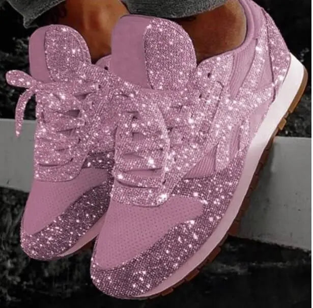 Women's glitter lace-up everyday sneakers, offering comfort and sparkle for casual fashion footwear.