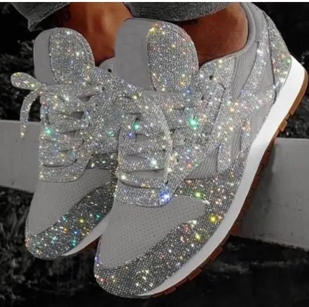 Stylish women's glitter lace-up sneakers, perfect for comfortable everyday wear and casual fashion.