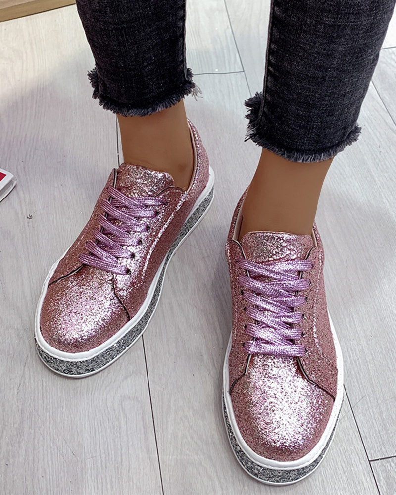 Trendy women's glitter platform sneakers. Fashion-forward footwear for stylish women who love comfort.