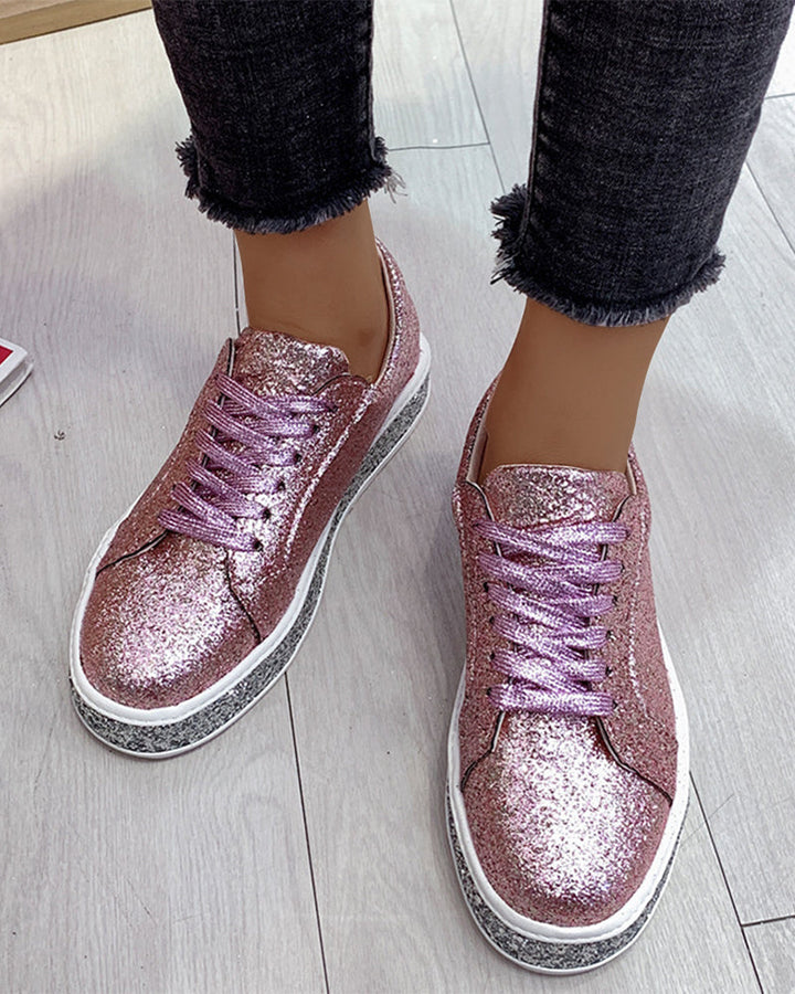 Trendy women's glitter platform sneakers. Fashion-forward footwear for stylish women who love comfort.
