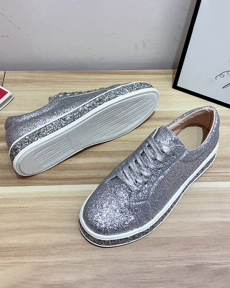 Modern women's glitter platform sneakers. Add a touch of sparkle to your look with these comfortable fashion shoes.