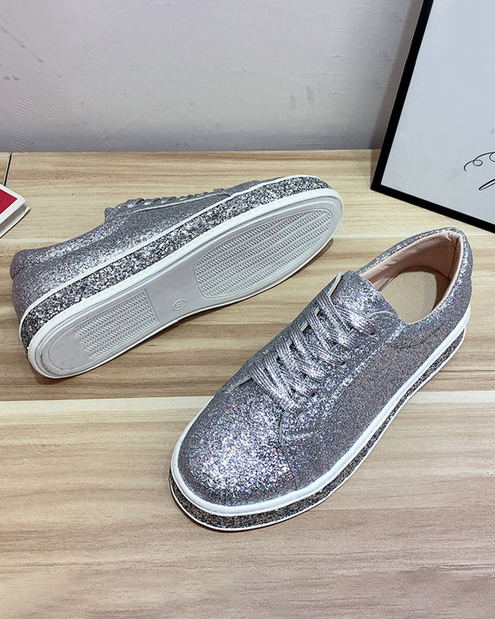 Modern women's glitter platform sneakers. Add a touch of sparkle to your look with these comfortable fashion shoes.