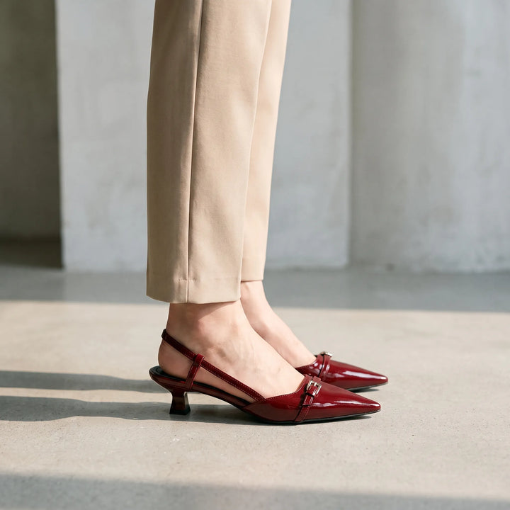 Women's glossy pointed toe slingback heels. Elegant dress shoes perfect for office, parties, and special occasions.