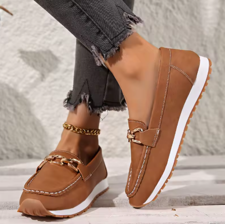 Top-down view of women's flatform loafers with gold chain, round toe. Comfortable slip-on shoes for everyday fashion.