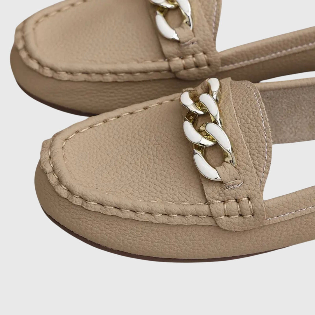 Fashionable women's wedge loafers: gold chain & crystal detail elevate these comfortable slip-on shoes.