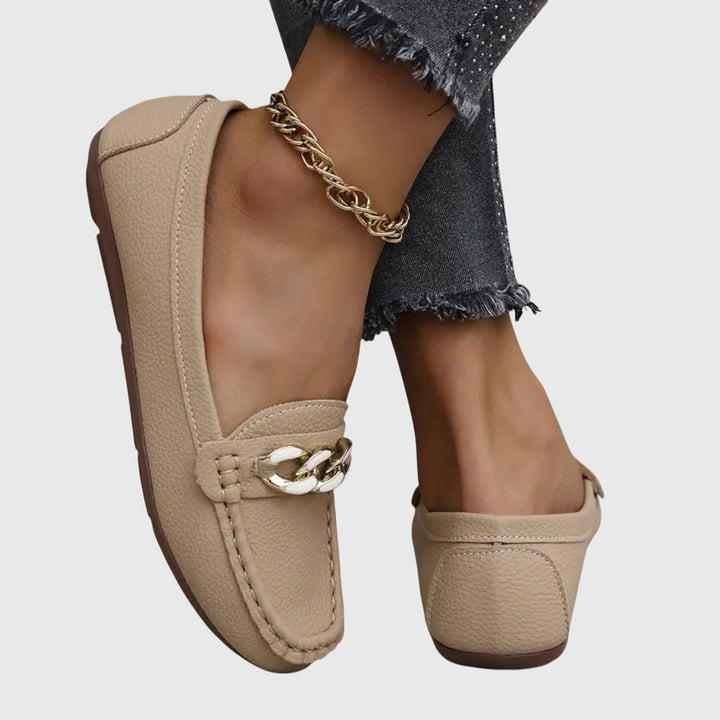 Women's round toe wedge loafers, slip-on style, featuring a dazzling gold chain and crystal detail.