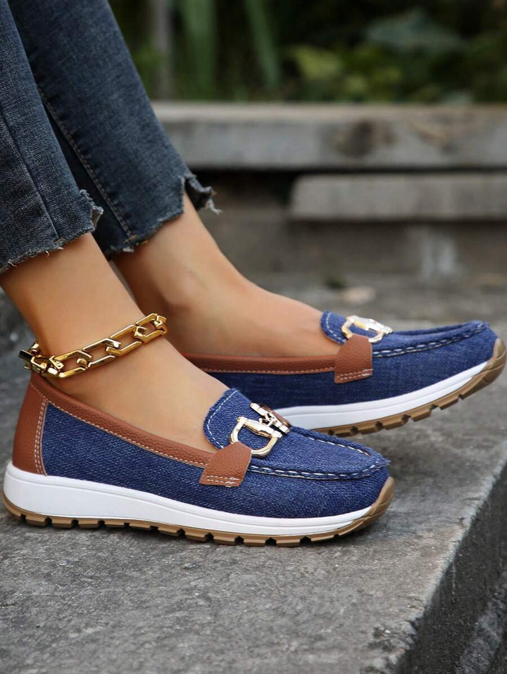 Women's classic horsebit loafers, featuring elegant gold trim. Comfortable slip-on footwear for all styles.