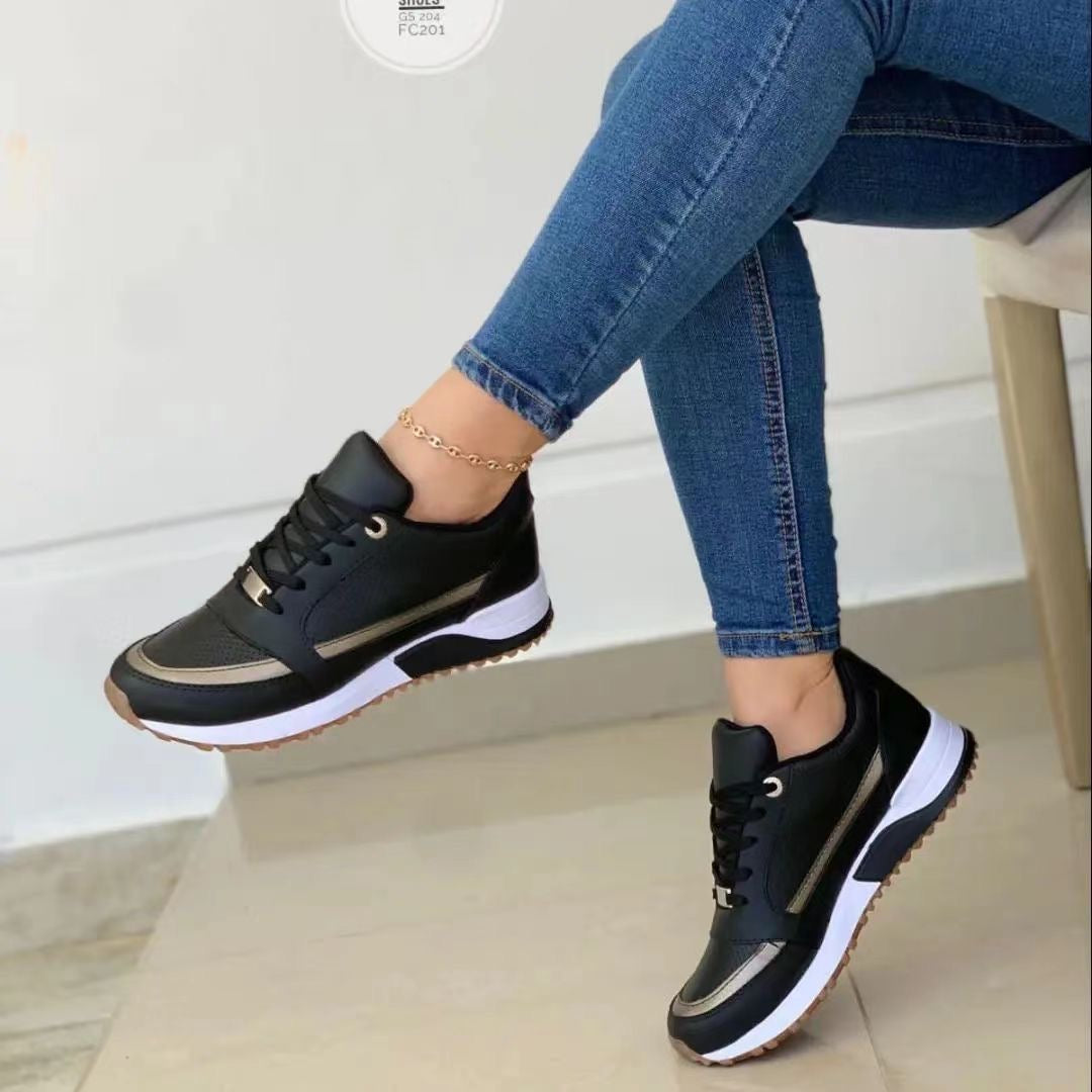 Women's fashion platform sneakers; lace-up design with gold trim for a comfortable, casual look.