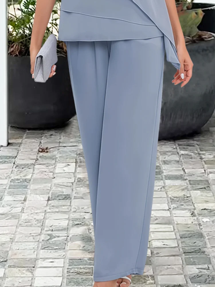 Women's 2-piece outfit featuring a graceful overlay top & relaxed fit straight-leg pants for elegant wear.