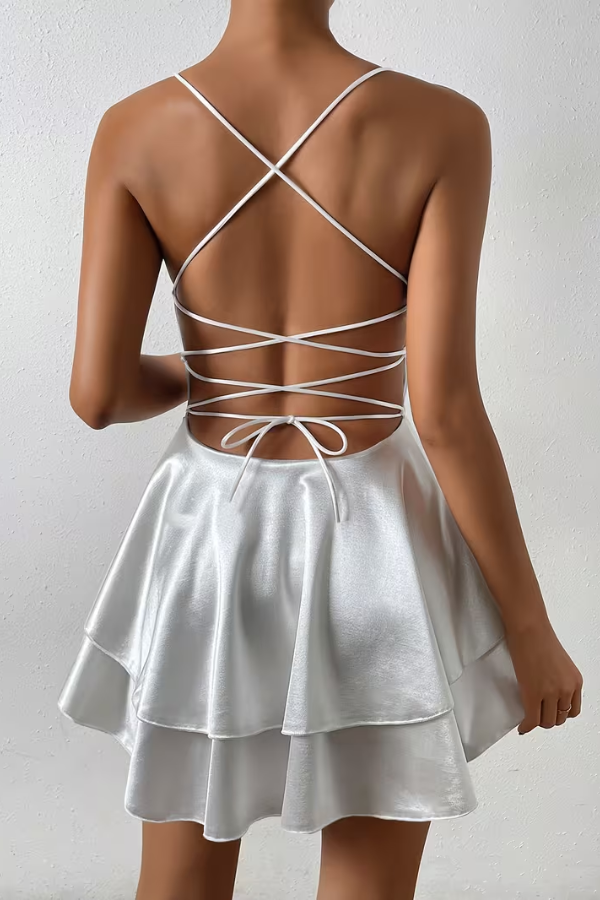 Elegant Women's Pleated Swing Cocktail Dress with a chic open back design.