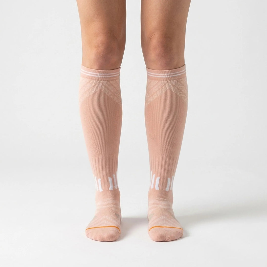 Comfortable women's knee-high compression socks, delivering excellent circulation support & leg relief for active lifestyles.
