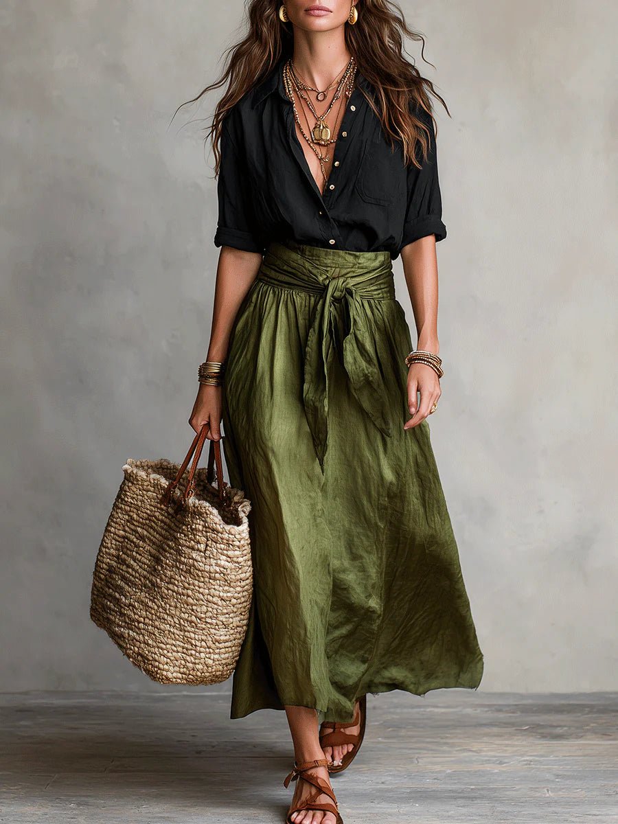 Women's green maxi skirt set featuring a button-front blouse & tie-waist skirt. Ideal for effortless summer style.
