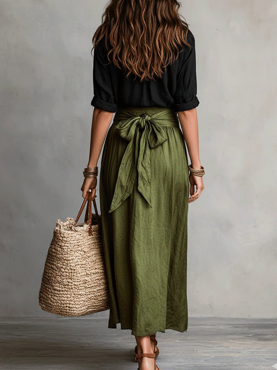 Relaxed fit women's green button-front blouse & tie-waist maxi skirt set. Comfortable resort wear for summer.