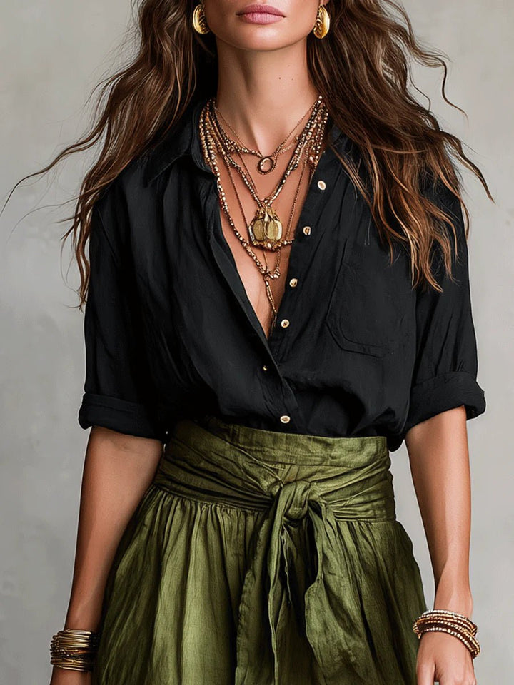 Women's green button-front blouse & maxi skirt set with a tie waist. Versatile for casual outings or resort wear.